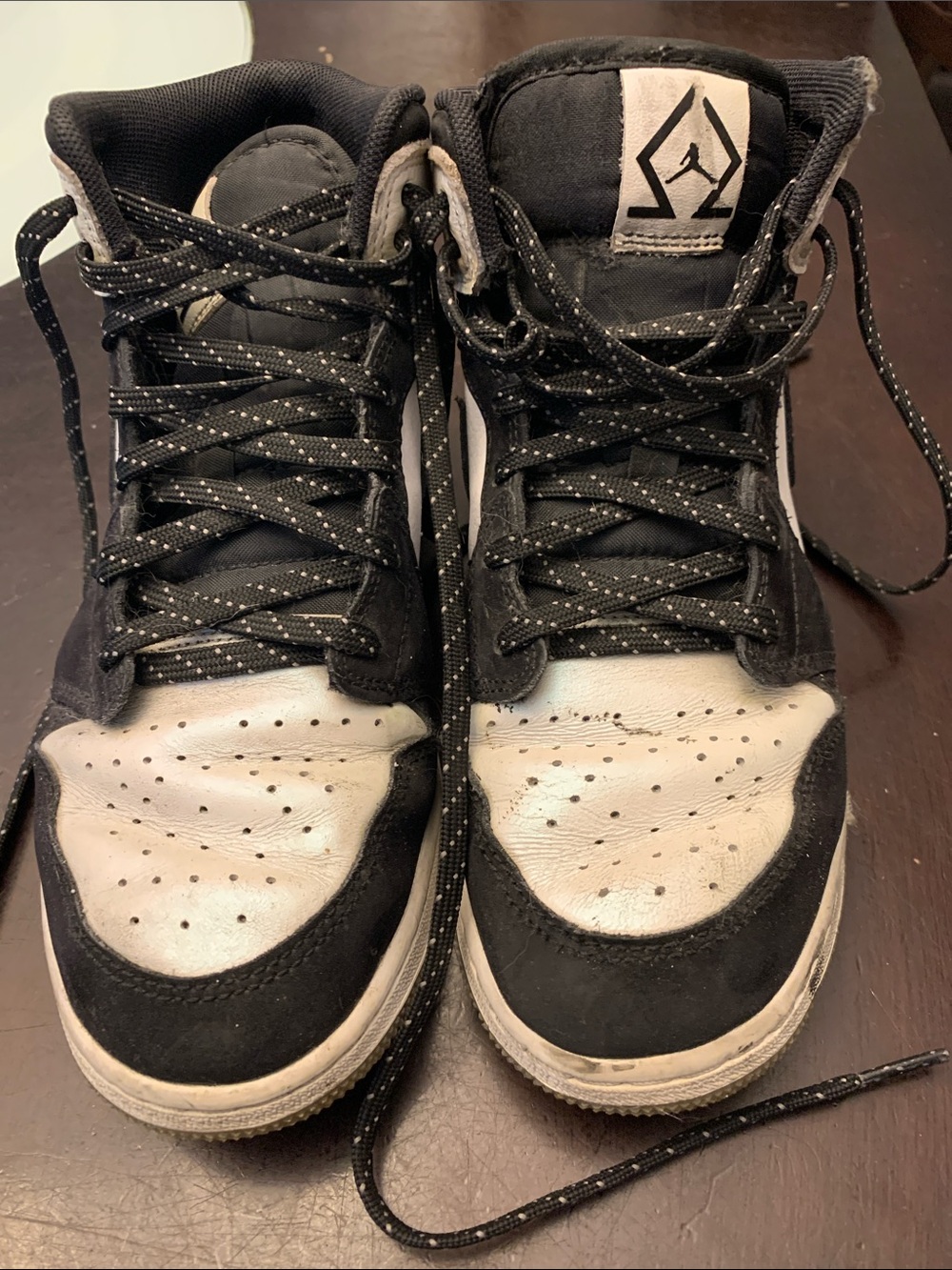 Nike Air Jordan Kids Black and White High-Top Sneakers with Reflective Laces